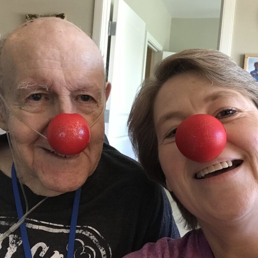 Senior client and Laura clowning around while participating in Red Nose Day